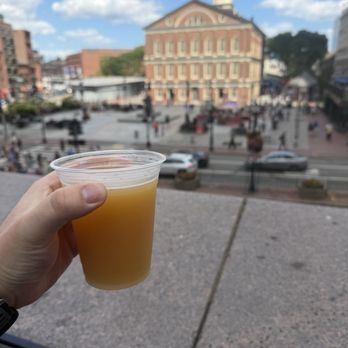 Distraction & Democracy Beer Garden - Widow maker hazy ipa with the view of the Faneuil Hall Marketplace - Beer Gardens Near Me - Boston, Massachusetts Distraction & Democracy Beer Garden - Widow maker hazy ipa with the view of the Faneuil Hall Marketplace - Beer Gardens Near Me - Boston, Massachusetts