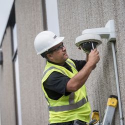 GSSC - General Security Services Corporation - Electronic Security Technician Installing A 180 Degree Camera