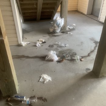 Tiffany's Motel - Trash and human excrement at entrance to closed pool - Hotels Near Me - Surf City, North Carolina