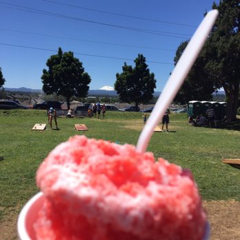 Crux Fermentation Project - The awesome outdoor space at cracks I got to have Hawaiian shaved ice while playing corn hole - Brewpubs Near Me - Bend, Oregon