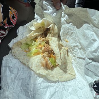Wendy's - a person eating a burrito - Fast Food Near Me - Houston, Texas Wendy's - a person eating a burrito - Fast Food Near Me - Houston, Texas