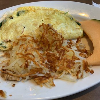 The Omelet Shop - Smoked salmon omelet with hash browns and a slice of cantaloupe - Breakfast & Brunch Near Me - Cape Coral, Florida The Omelet Shop - Smoked salmon omelet with hash browns and a slice of cantaloupe - Breakfast & Brunch Near Me - Cape Coral, Florida
