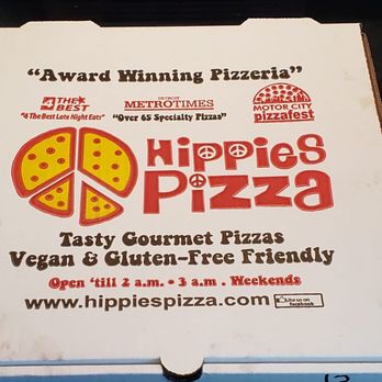 Hippies Pizza - a pizza box with a slice missing - Pizza Near Me - Royal Oak, Michigan Hippies Pizza - a pizza box with a slice missing - Pizza Near Me - Royal Oak, Michigan