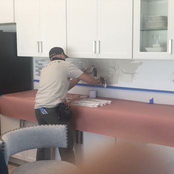 TNT Tile - TNT Tile owner, Ryan, installing backsplash tile - Tiling Near Me