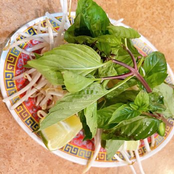 Pho Vie II - a plate of noodles and greens - Vietnamese Near Me - Garden Grove, California Pho Vie II - a plate of noodles and greens - Vietnamese Near Me - Garden Grove, California
