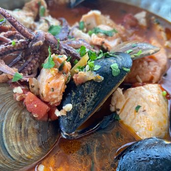 Schooners Monterey - Monterey Cioppino Pot, perfectly balanced and flavorful! - Seafood Near Me - Monterey, California Schooners Monterey - Monterey Cioppino Pot, perfectly balanced and flavorful! - Seafood Near Me - Monterey, California