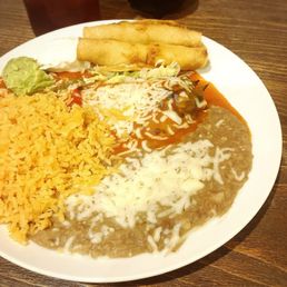 Chile relleno&taquitos combo with rice and beans