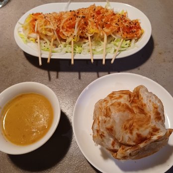 Phat Eatery - Top-award winning kerabu pawn, $13. Bottom-roti with chicken curry dip, $5. - Malaysian Near Me - Katy, Texas