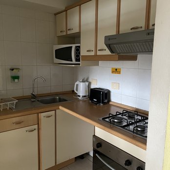 MR Mar Suites - Kitchen area. - Hotels Near Me - Renaca, VS