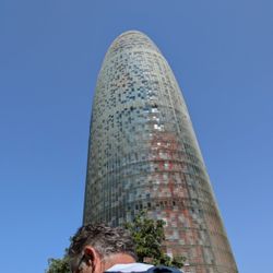 Barcelona City Tour - All sorts of buildings to get information on... both newer and older. This is the Torre Glóres building.