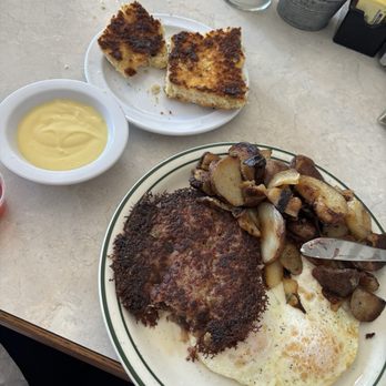 Lil'Bits - Corned beef hash, eggs (over medium) home fries and homemade biscuit (side of hollandaise) - American Near Me - Grover Beach, California
