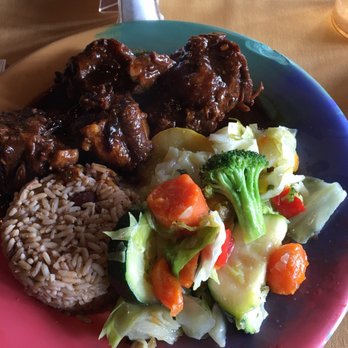 Reggae Hut - Oxtail with rice and peas + cabbage and veggies - Caribbean Near Me - Houston, Texas