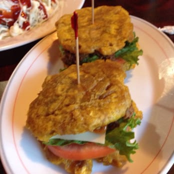 Division Cafe - Tostone sliders - perfectly fried plantains, flavorful shredded beef, on a bed of lettuce, tomato, cheese and sauce. Yum! - Latin American Near Me - Somerville, New Jersey Division Cafe - Tostone sliders - perfectly fried plantains, flavorful shredded beef, on a bed of lettuce, tomato, cheese and sauce. Yum! - Latin American Near Me - Somerville, New Jersey