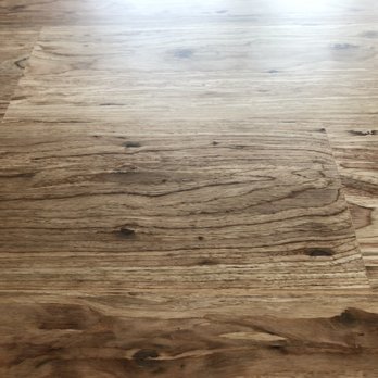 Finn Wood Flooring - After...any spaces between boards still left after the grind, they filled and buffed it down for a seamless finish. - Flooring Near Me - Austin, Texas