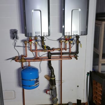 Universal Plumbers - Completed installation of 2 new tankless water heaters for an 8 bathroom home. Call us today for a free estimate! - Plumbing Near Me - Los Angeles, California Universal Plumbers - Completed installation of 2 new tankless water heaters for an 8 bathroom home. Call us today for a free estimate! - Plumbing Near Me - Los Angeles, California