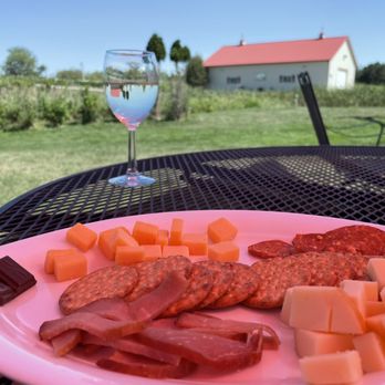 Millner Heritage Vineyard & Winery - Cheese and meat plate with a glass of their Gemutlichkeit - Wine Tours Near Me - Kimball, Minnesota Millner Heritage Vineyard & Winery - Cheese and meat plate with a glass of their Gemutlichkeit - Wine Tours Near Me - Kimball, Minnesota