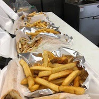 Sara’s Deli and Wings - a long table of food - Sandwiches Near Me - Talladega, Alabama Sara’s Deli and Wings - a long table of food - Sandwiches Near Me - Talladega, Alabama