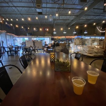 Pontoon Brewing - two beers on a table - Breweries Near Me - Sandy Springs, Georgia