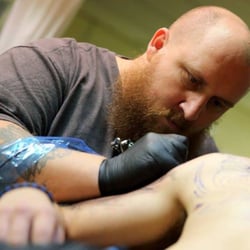 Bury the Needle Tattoo - greg, hard at work doing what he does best.