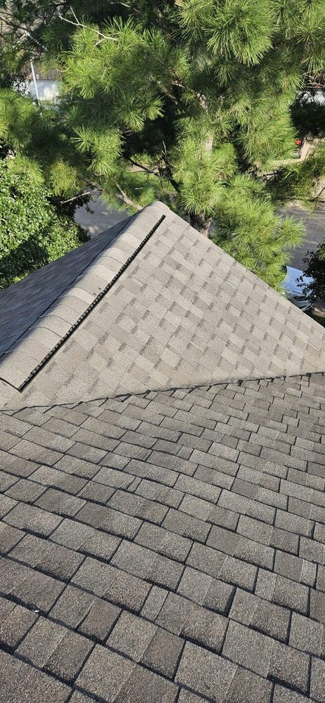 Slide of CM Roofing Pros