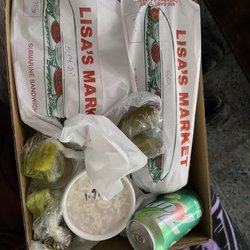 Lisa's Market - Two subs, Macaroni Salad, pickles, pepperchinis and all the fixings!! The best!