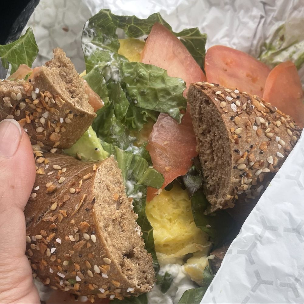 Breakfast sandwich with bagel cut but not egg. So hard to eat on the go for customer