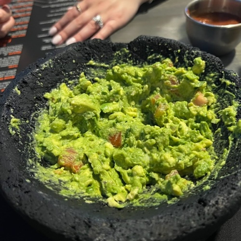 Fresh guac made at your table