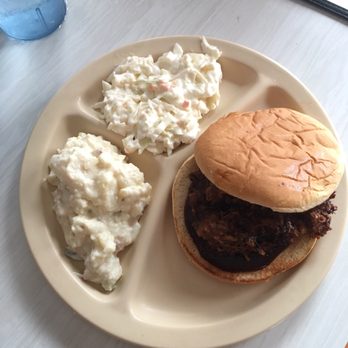 Pete's Drive-In - Pulled pork sandwich, potato salad, and cole slaw. - American Near Me - Walhalla, South Carolina Pete's Drive-In - Pulled pork sandwich, potato salad, and cole slaw. - American Near Me - Walhalla, South Carolina
