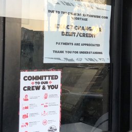 a sign on the door of a restaurant