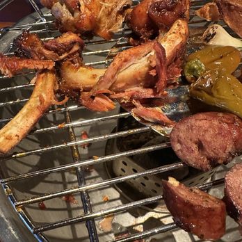 Smokey Bones Clearwater - Bone Fire look at the ribs and the feathers on the chicken - Barbeque Near Me - Clearwater, Florida