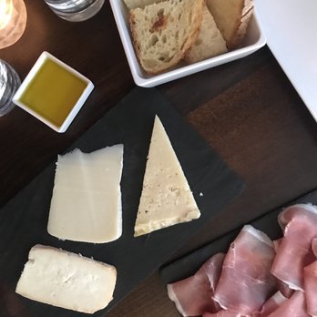 Winehouse Osteria - Meat and cheese board with complimentary bread - Italian Near Me - Brussels, BRU Winehouse Osteria - Meat and cheese board with complimentary bread - Italian Near Me - Brussels, BRU