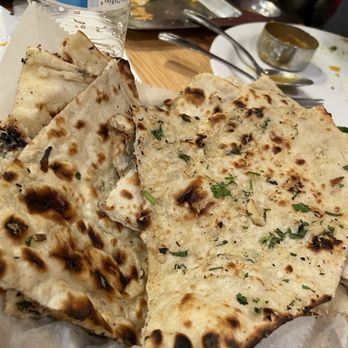 Rajni Indian Cuisine - Assorted Naans - Indian Near Me - Suwanee, Georgia Rajni Indian Cuisine - Assorted Naans - Indian Near Me - Suwanee, Georgia