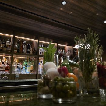 Canary - Bar top garnish set up with back bar - Speakeasies Near Me - Breckenridge, Colorado