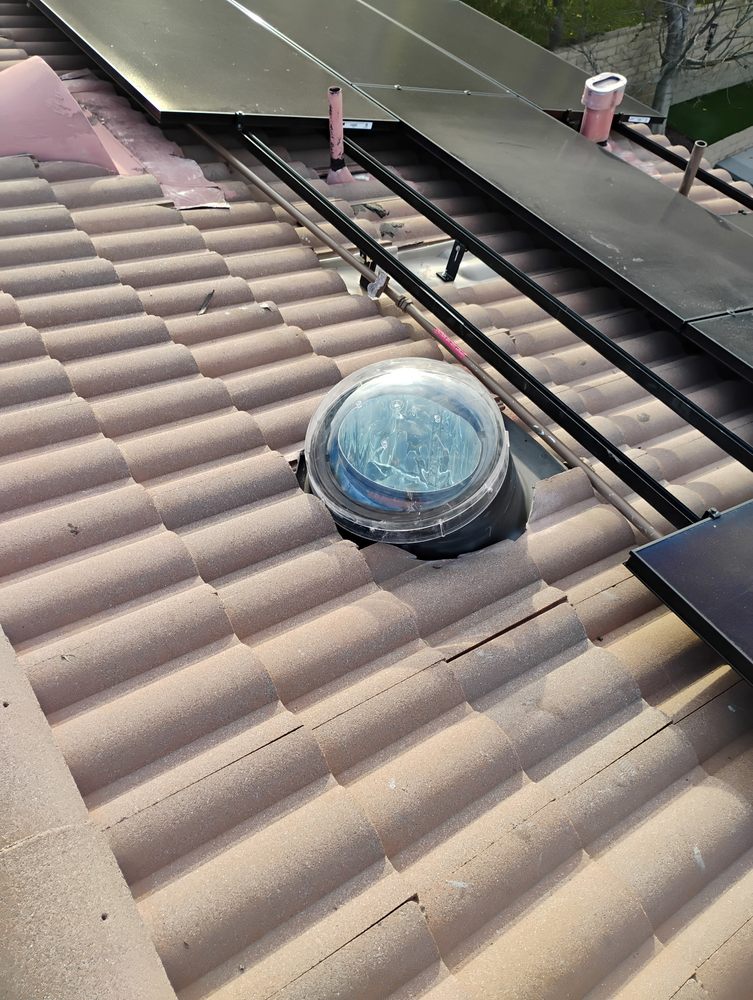 Slide of Kayhan's Roofing