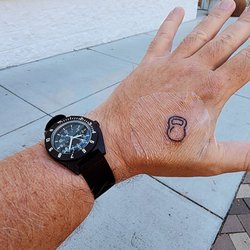 Lady Octopus Tattoos - I got a kettlebell tattooed on my left hand to forcefully remind me to lift and swing. Caitlin Astrid was amazing.