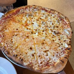 The Works Pizza - Extra cheese pep/sausage on half.