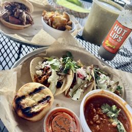 Today: Chopped Brisket sandwich and pork butt tacos w/red chili. So, so outstanding!
