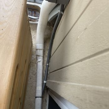 Arctic Cooling Solutions - Poorly installed tubing that isn't even sealed. - Heating & Air Conditioning/HVAC Near Me Arctic Cooling Solutions - Poorly installed tubing that isn't even sealed. - Heating & Air Conditioning/HVAC Near Me