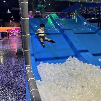 Altitude - Sliding into the ball pit - Venues & Event Spaces Near Me - Webster, Texas