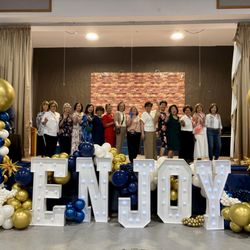 Wow Factor Moments - St Basils celebrating their priests' retirement w/(2) 8ft balloon columns, 4' light up marquee letters & 10ft luxury organic balloon display