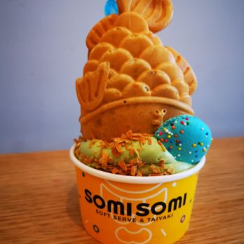 Somisomi - Upside down style matcha soft serve with coconut flakes, red bean filled taiyaki, and macaron on top - Ice Cream & Frozen Yogurt Near Me - Pleasanton, California Somisomi - Upside down style matcha soft serve with coconut flakes, red bean filled taiyaki, and macaron on top - Ice Cream & Frozen Yogurt Near Me - Pleasanton, California
