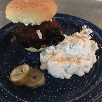 The Grey - Their fried chicken sandwich with tater salad - New American Near Me - Savannah, Georgia The Grey - Their fried chicken sandwich with tater salad - New American Near Me - Savannah, Georgia