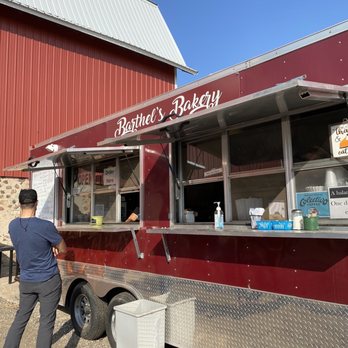 Barthel Fruit Farm - a man standing in front of a food truck - Fruits & Veggies Near Me - Mequon, Wisconsin