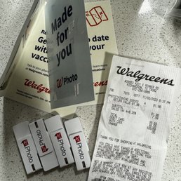 a receipt, scissors, and a pair of scissors