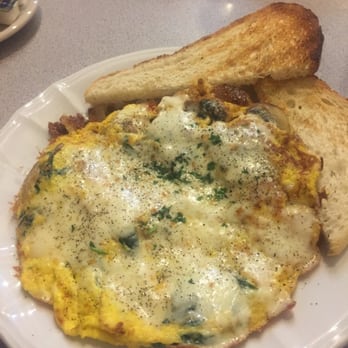 Demitasse Cafe - Italian Frittata....hot and fresh! I added mushrooms. - Breakfast & Brunch Near Me - Chicago, Illinois Demitasse Cafe - Italian Frittata....hot and fresh! I added mushrooms. - Breakfast & Brunch Near Me - Chicago, Illinois