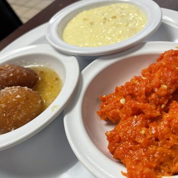 Punjabi Dhaba - three bowls of food on a white plate - Indian Near Me - Hammond, Louisiana