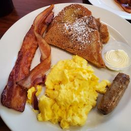 Scrambled eggs, bacon, French toast and sausage link. The French toast was awesome! Scrambled eggs, bacon, French toast and sausage link. The French toast was awesome!