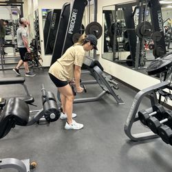 Peak Fitness - My wife getting a good arm workout.
