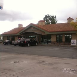 a car parked in front of a restaurant