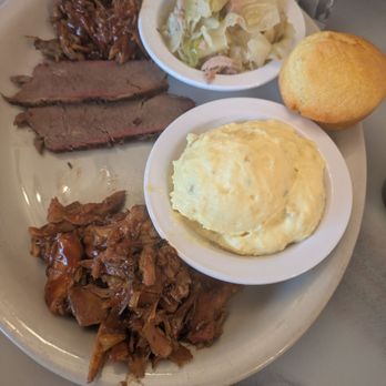 Baldwin's Smokehouse Barbeque - Pulled pork, brisket, and pulled chicken with braised cabbage and potato salad and corn bread. - Barbeque Near Me - Saginaw, Michigan Baldwin's Smokehouse Barbeque - Pulled pork, brisket, and pulled chicken with braised cabbage and potato salad and corn bread. - Barbeque Near Me - Saginaw, Michigan
